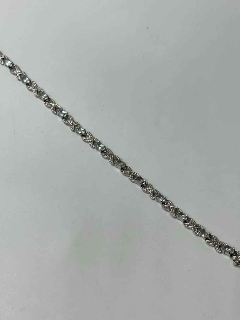 Infinity Link Tennis Bracelet Sterling Silver Blue Oval Stones 8 Grams 7.25”